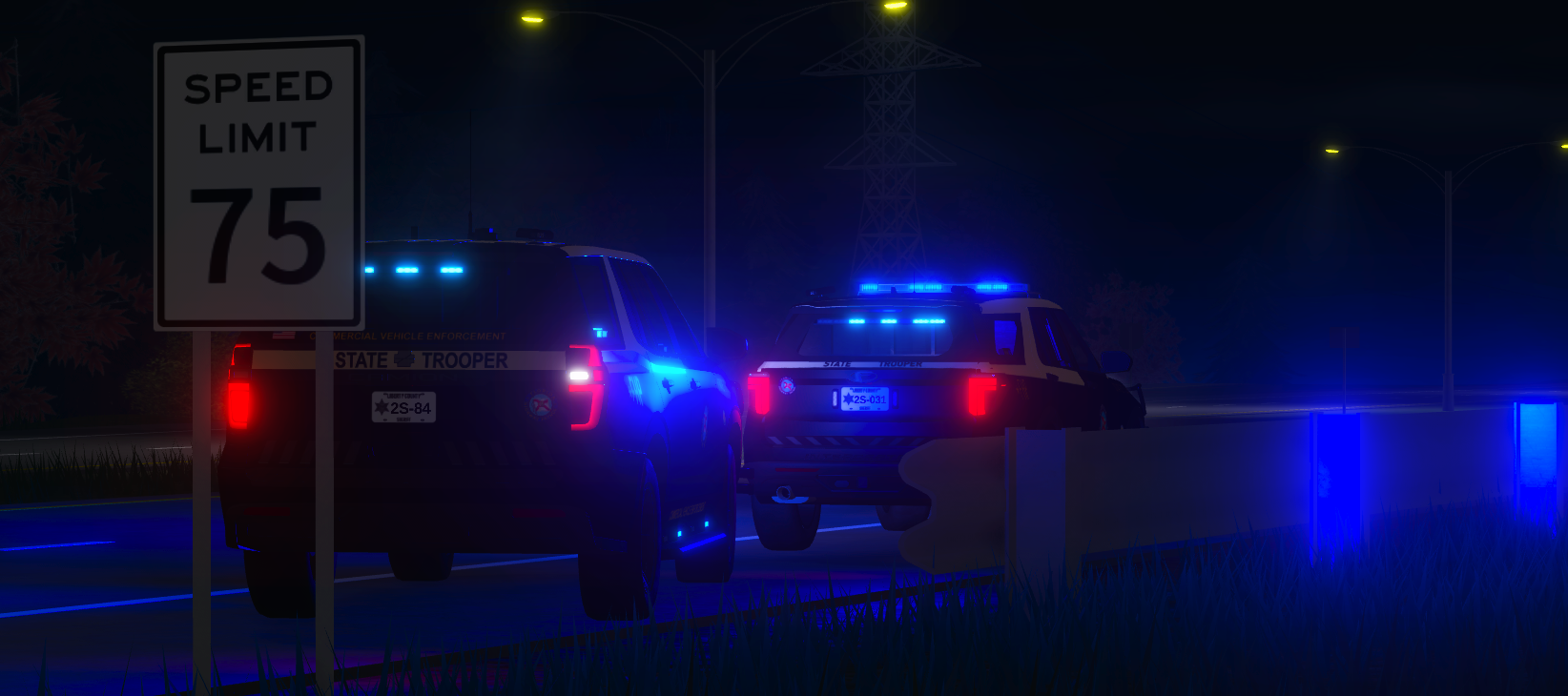 Florida state trooper vehicles with blue emergency lights at night